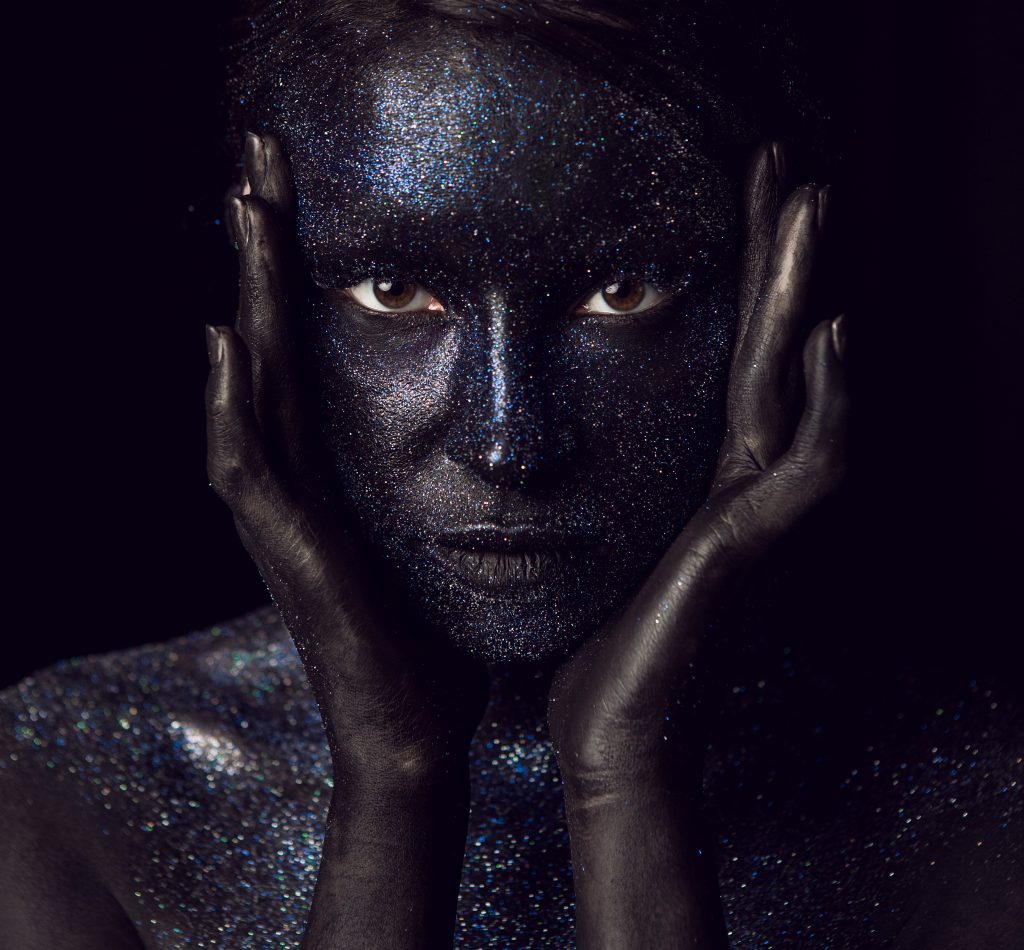 portrait-black-hand-fashionable-paint-face-w-2023-11-27-05-28-18-utc